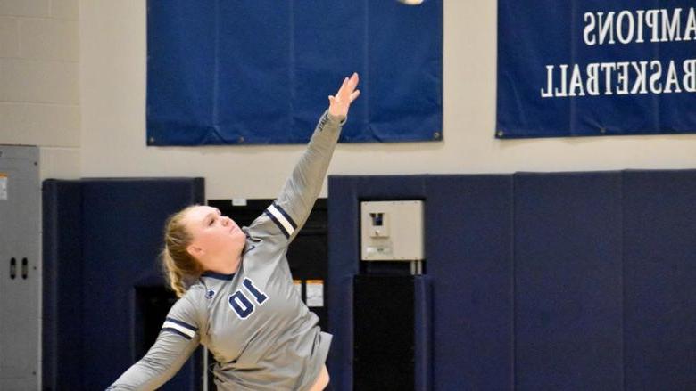 365英国上市杜波依斯分校 senior Paige Pleta follows through on her strike during the home match against Penn State New Kensington at the PAW Center.